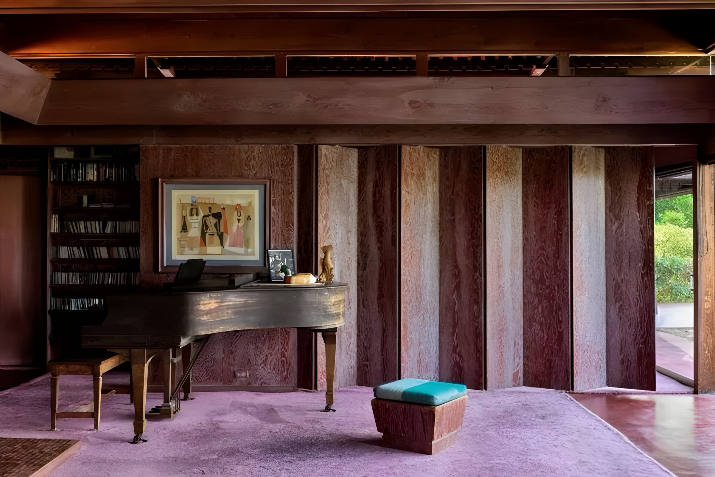 Warm wood music room with a grand piano